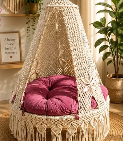 50 inch natural cotton macrame swing with pink cushion in a living room