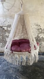 Actual photo of the 50 inch natural macrame swing with pink cushion
