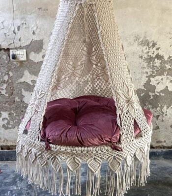 Actual photo of the 50 inch natural macrame swing with pink cushion