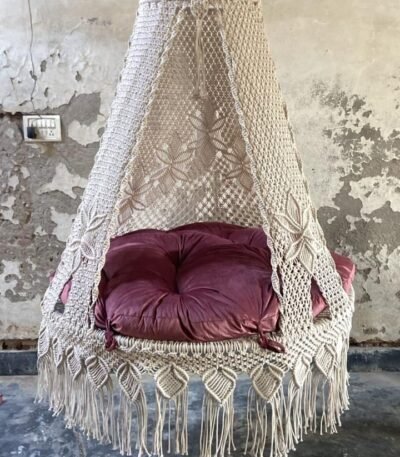 Actual photo of the 50 inch natural macrame swing with pink cushion