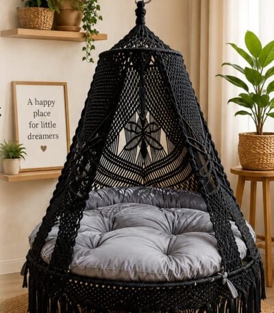 60 inch black macrame swing with grey cushion in a living room