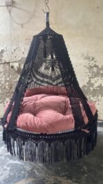 Actual photo of the 60 inch black macrame swing with pink cushion