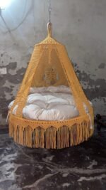 Actual photo of the 60 inch mustard macrame swing with cream cushion