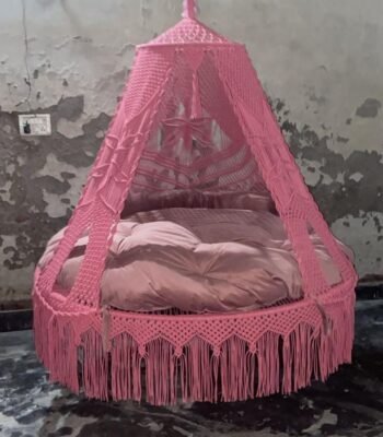 Actual photo of the 70 inch baby pink macrame swing with pink cushion
