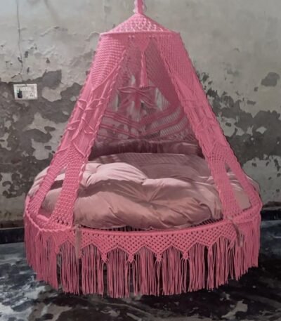 Actual photo of the 70 inch baby pink macrame swing with pink cushion