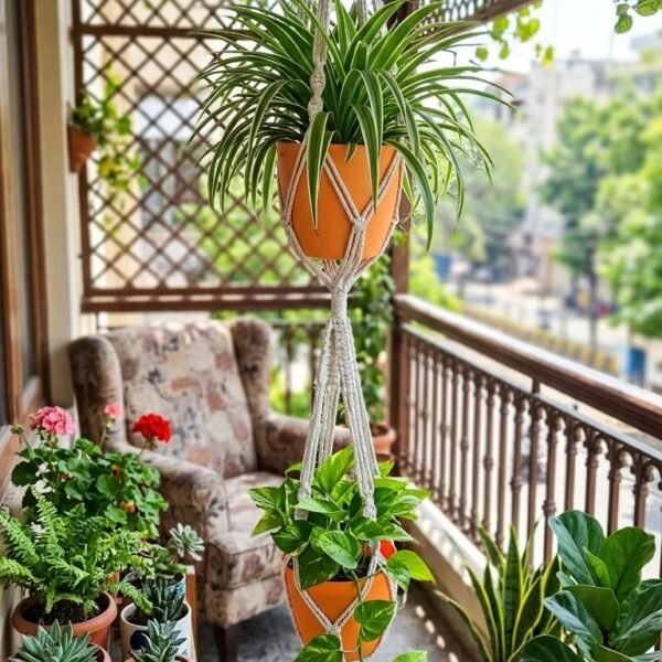 Two-tier macrame double plant hanger with two pots on a balcony