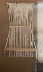 Real photo of ProKnots handmade macrame wall hanging shelf with butterfly design