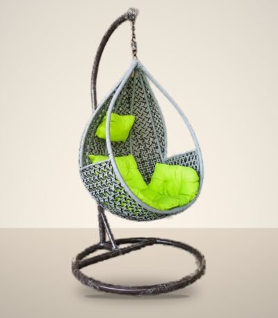 Grey HDPE wicker hanging teardrop chair swing with stand and lime green cushions, studio background