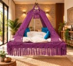 ProKnots Queen Size macrame bed swing jhula in a living room, with mattress and blue cushions